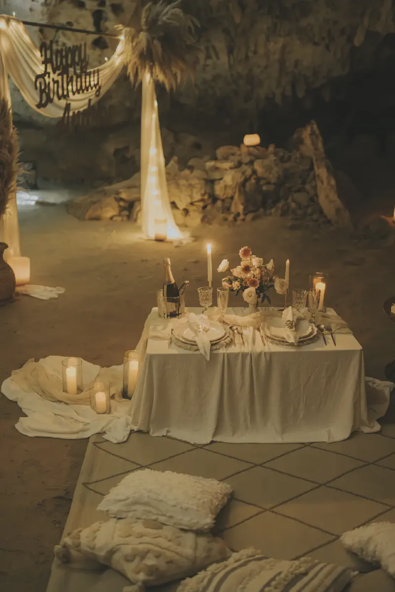 Couple enjoying a romantic dinner on a private yacht in Cancún